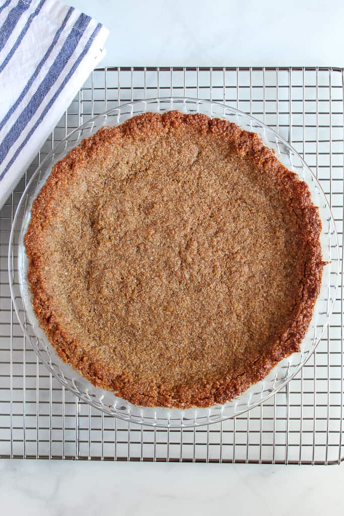 almond flour graham cracker crust on a wire rack