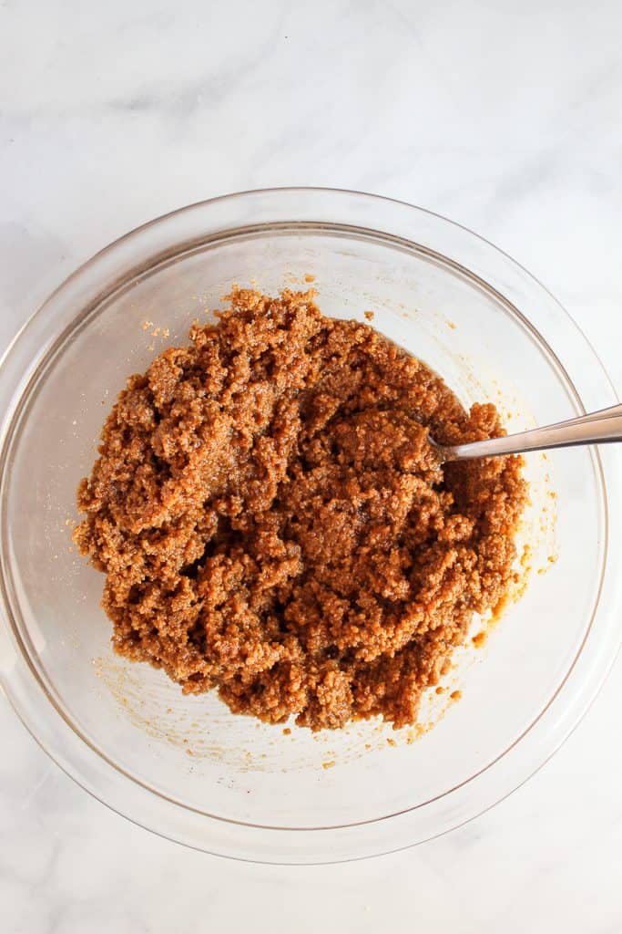 almond flour graham cracker crust mixed in a glass bowl