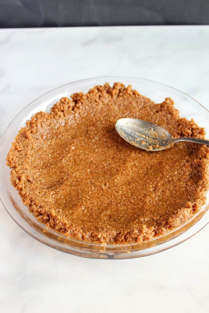 almond flour graham cracker crust in a pie plate.