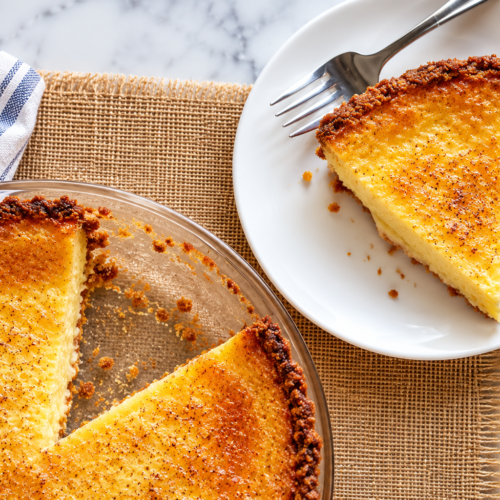 Slice of gluten-free buttermilk pie on a plate