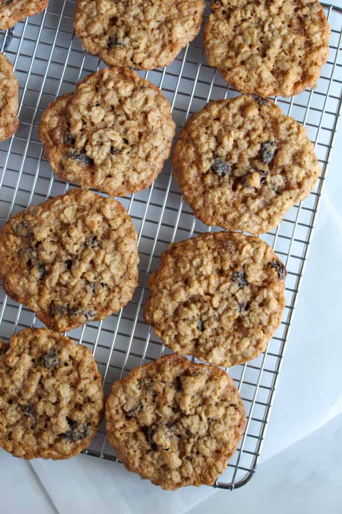 gluten free oatmeal raisin cookies on a wire cooling rack