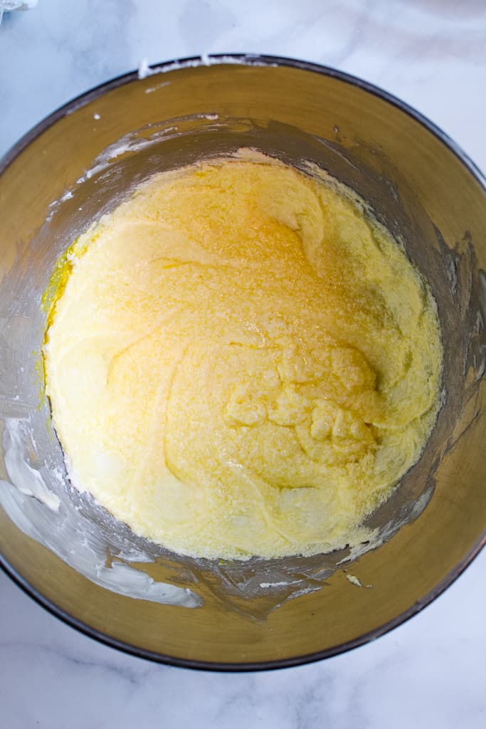 gluten free lemon pound cake batter in a stand mixer