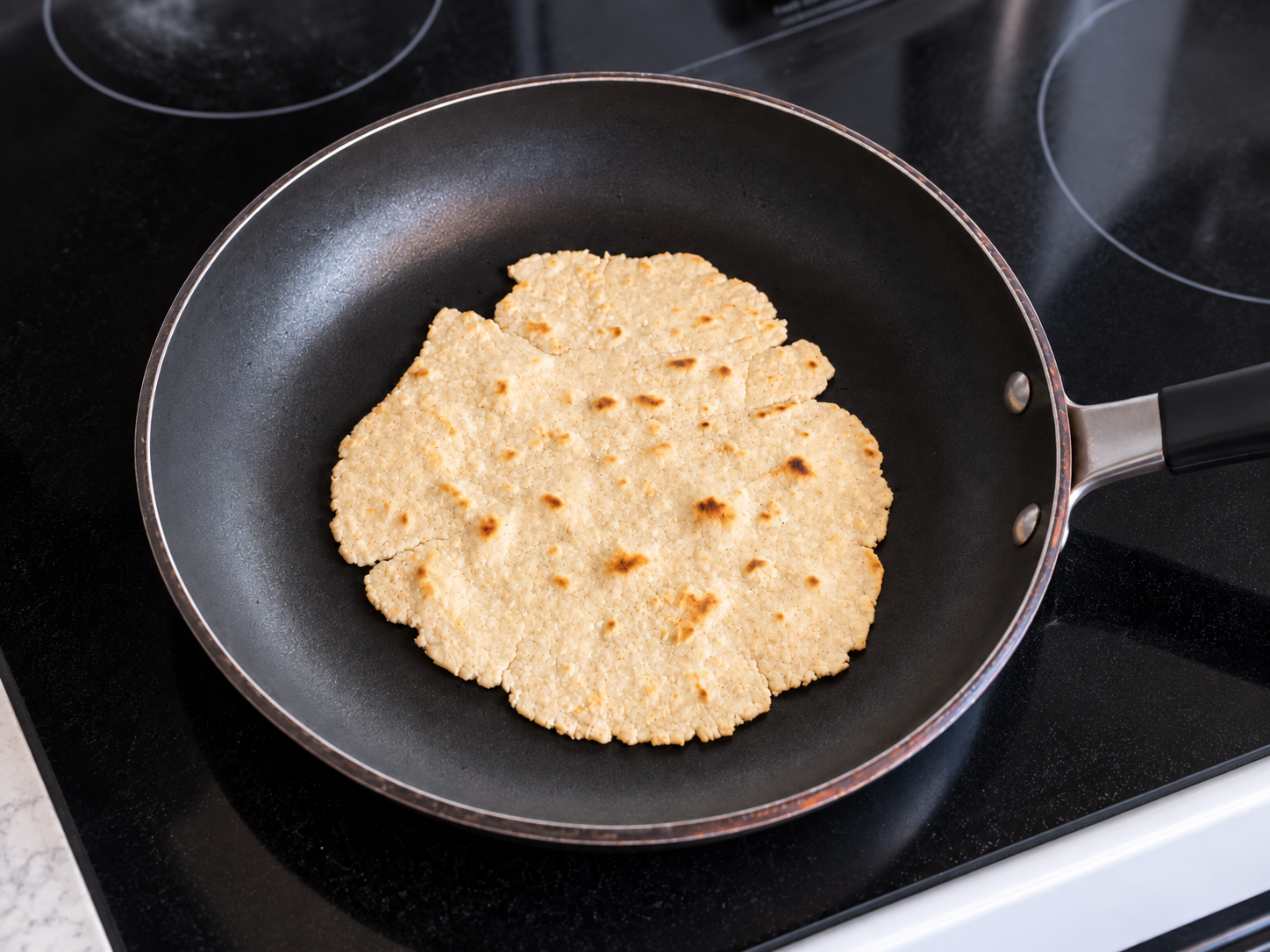 cassava flour tortillas in skillet