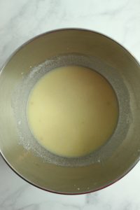 gluten free potato rolls liquid mixed in a bowl