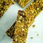homemade granola bars stacked on a plate