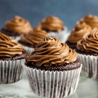 side shot of cupcakes on a platter