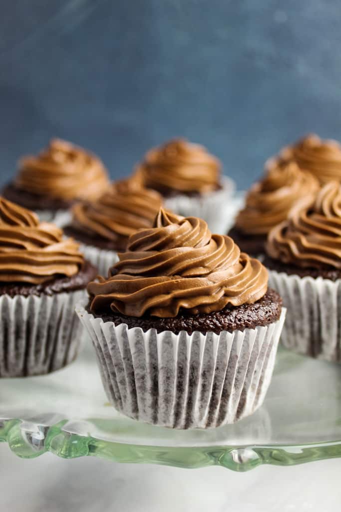 side shot of cupcakes on a platter