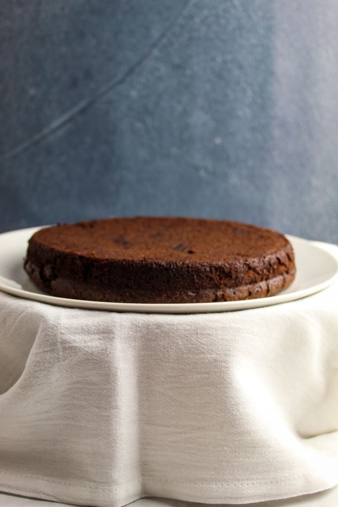 baked cake cooling on a plate