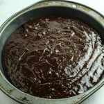 flourless chocolate cake batter poured into baking pan