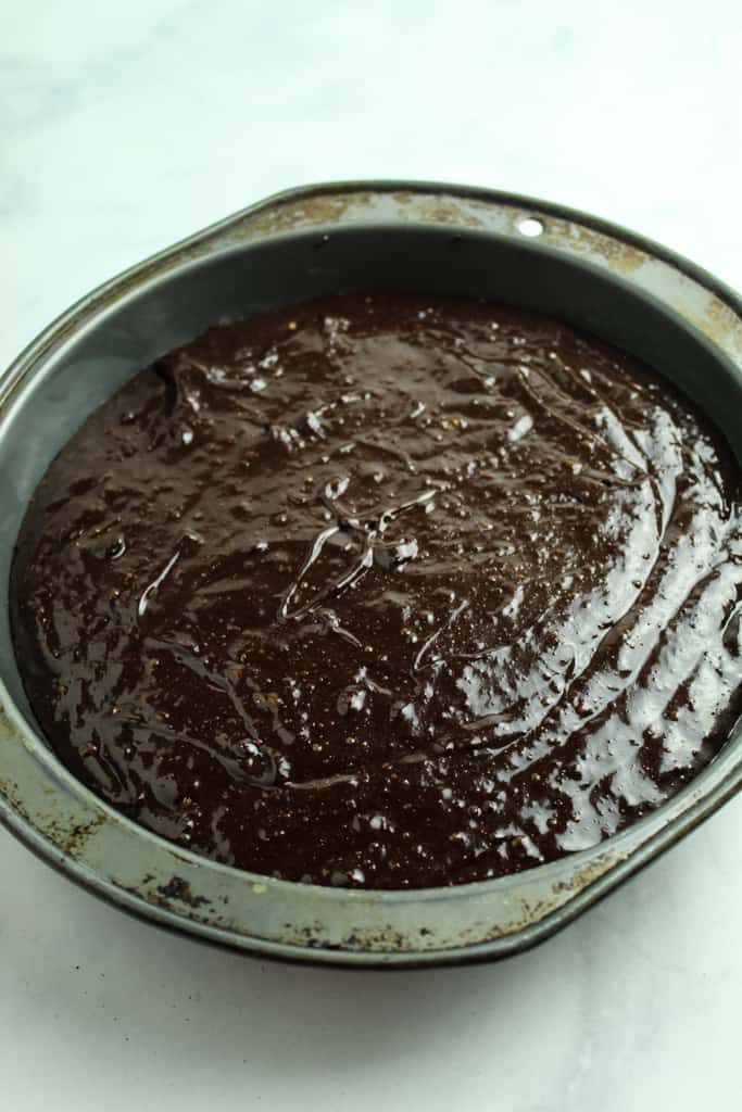 flourless chocolate cake batter poured into baking pan