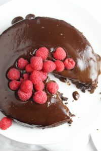 flourless chocolate cake topped with dairy free chocolate ganache