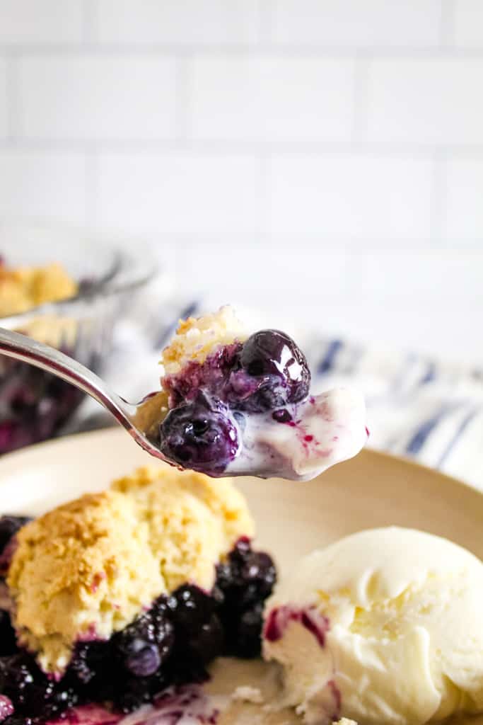 up close shot of bite of cobbler on spoon