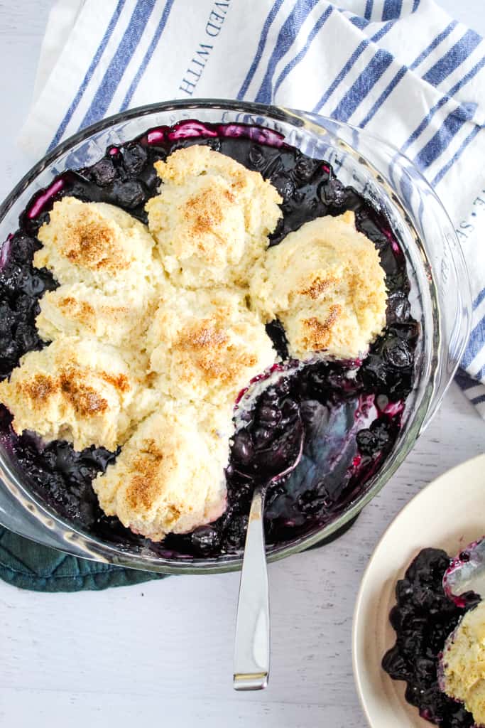 overhead shot of bowl of blueberry cobbler