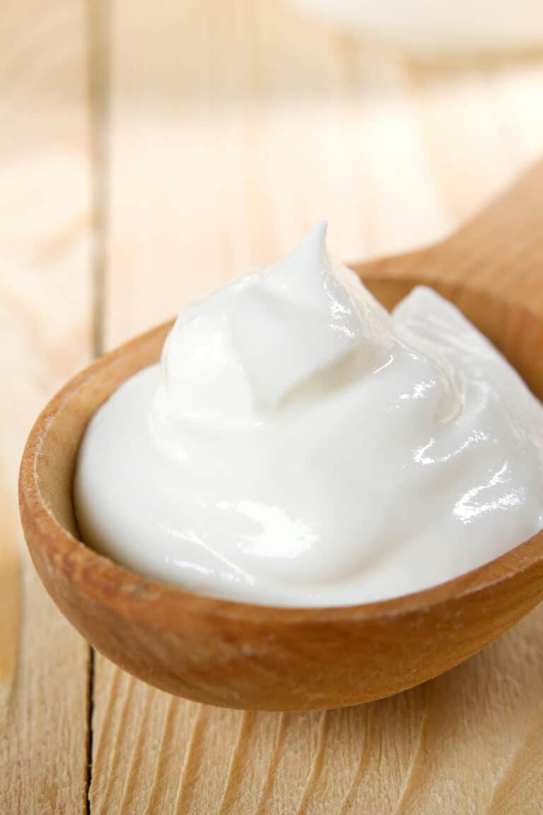 spoon up close of sour cream
