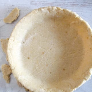 ovehead shot of a pie crust in a pie plate