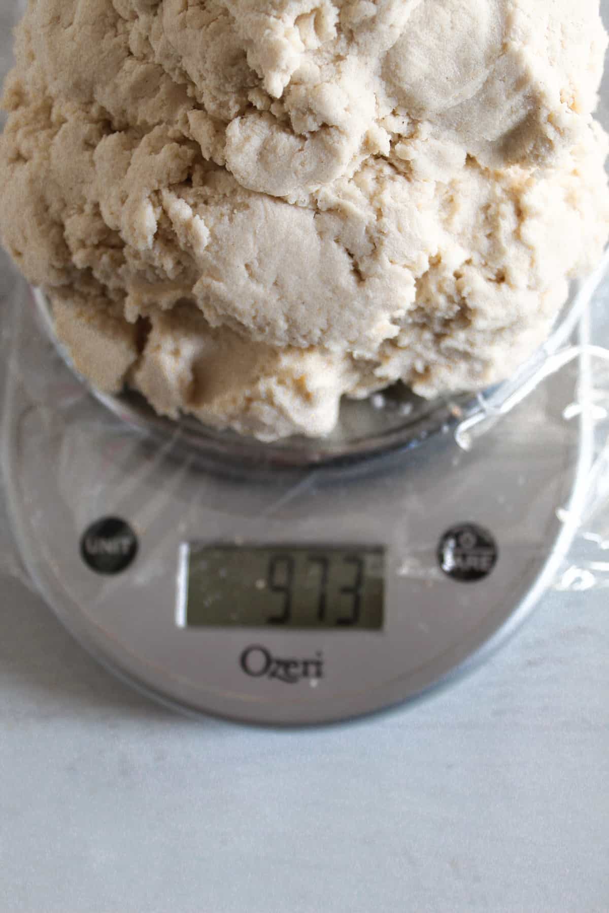 weighing pie crust on a scale