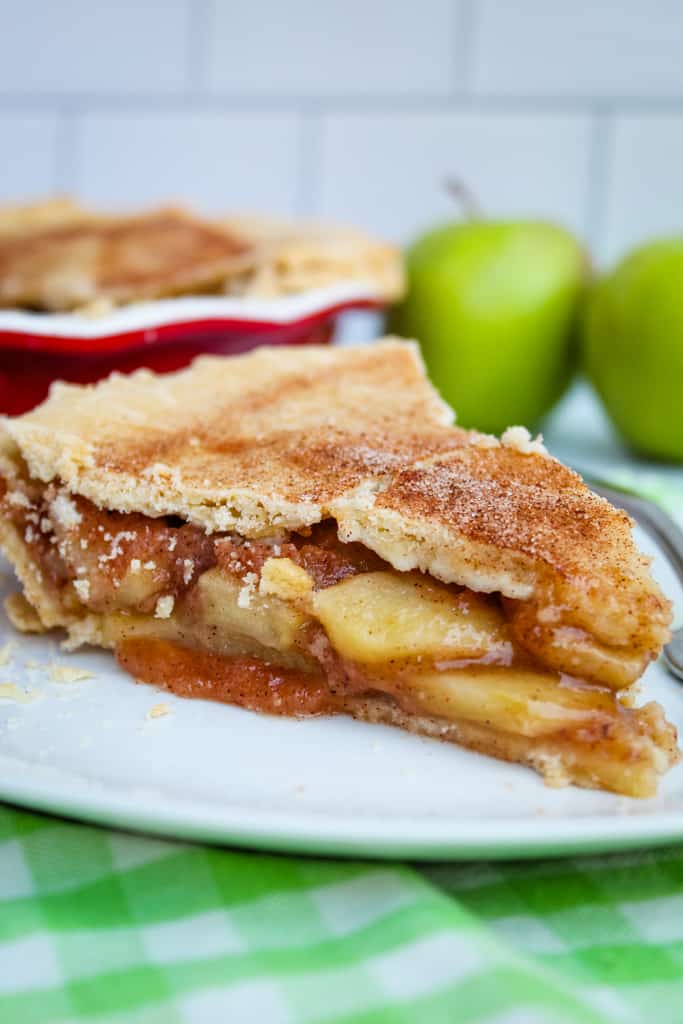 side shot of slice of apple pie