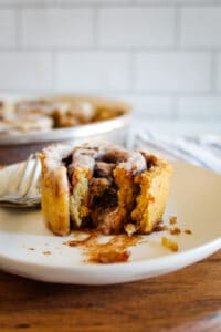 inside of a cinnamon roll on a white plate
