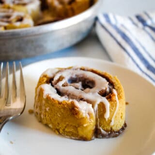 cinnamon roll on a white plate