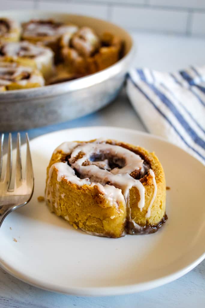 cinnamon roll on a white plate