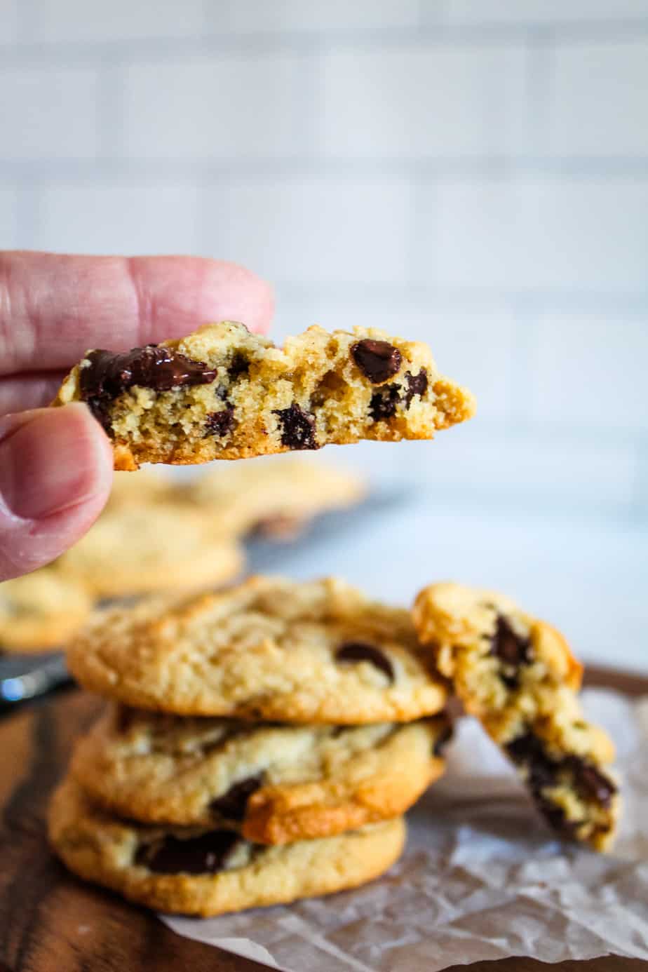 hand holding a Gluten-Free Dairy-Free Chocolate Chip Cookies