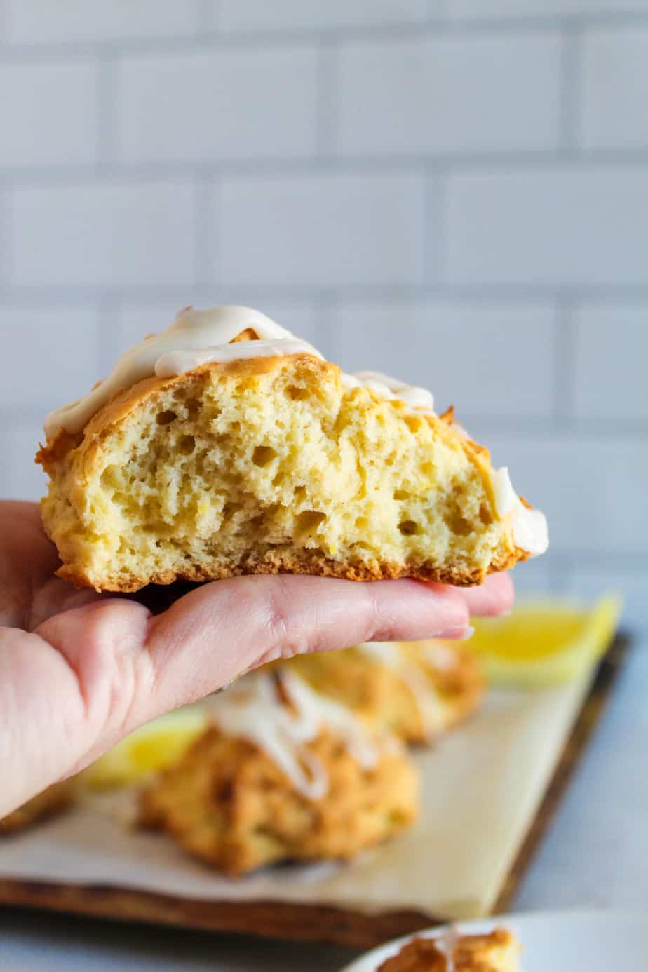 hand holding a Gluten-Free Lemon Scones 