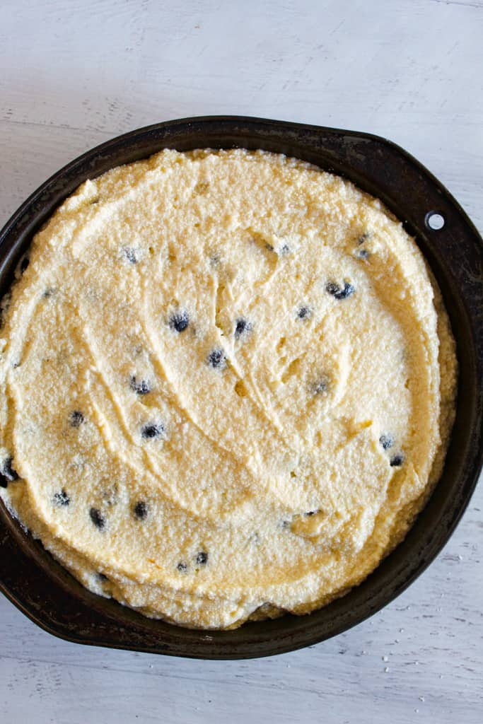 blueberry cake batter in the pan