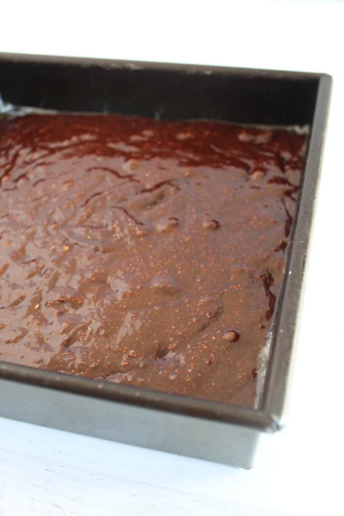 brownie batter in an 8 inch pan