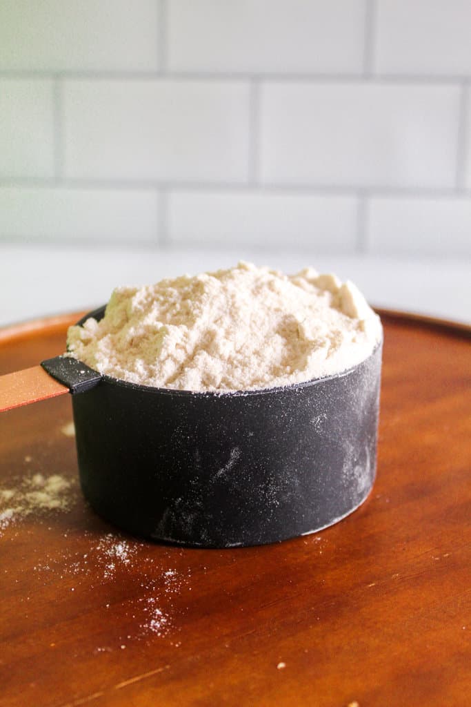 brown rice flour in a measuring cup.