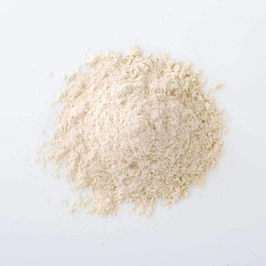 quinoa flour on a white counter.
