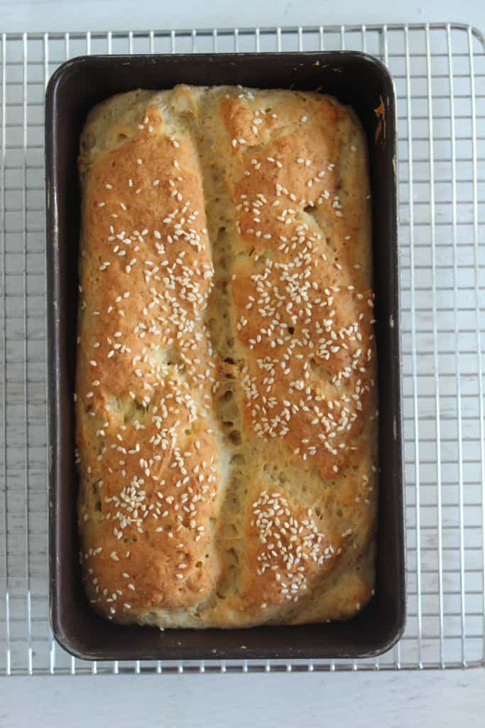 baked bread in a loaf pan.