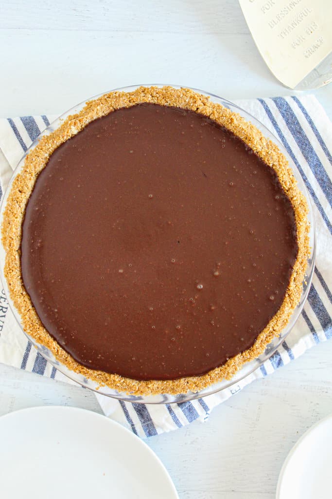 whole chocolate pie on a counter.
