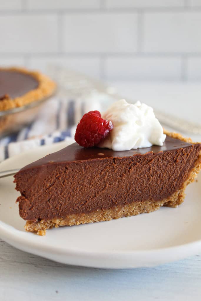 slice of chocolate pie on a white plate.
