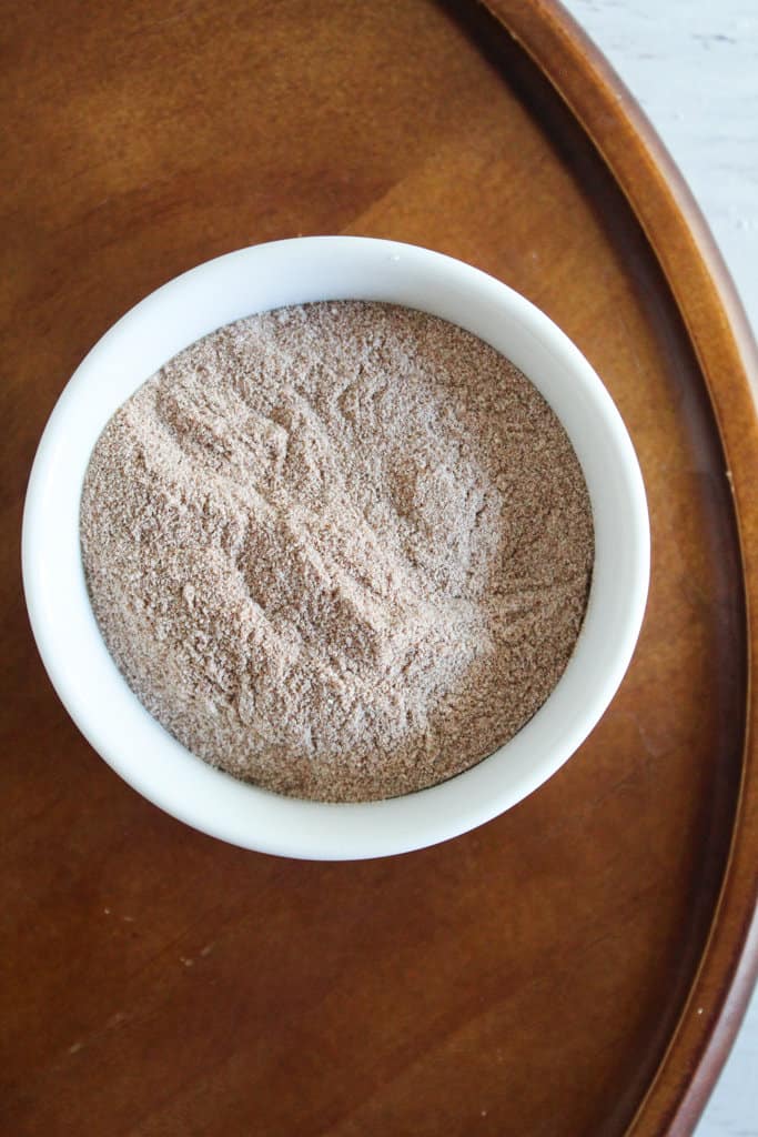 white bowl of teff flour.