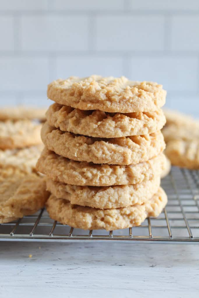 stack of almond flour peanut butter cookies on a plate.