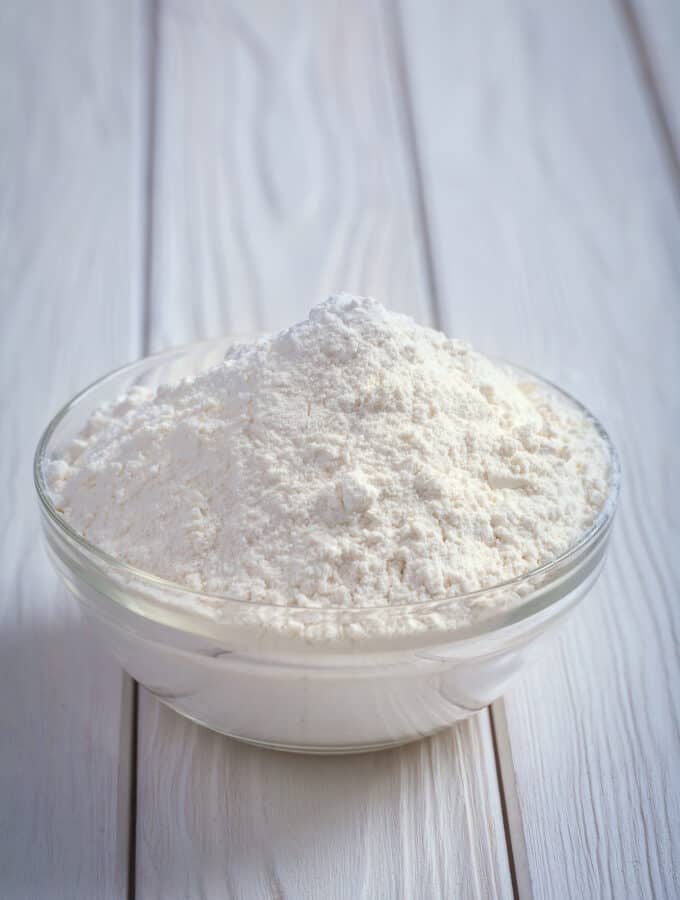 bowl of flour on a counter.