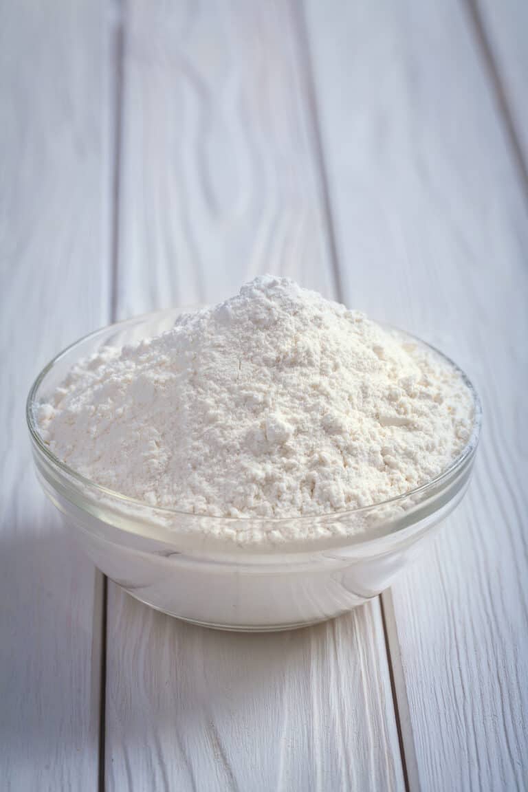 bowl of flour on a counter.