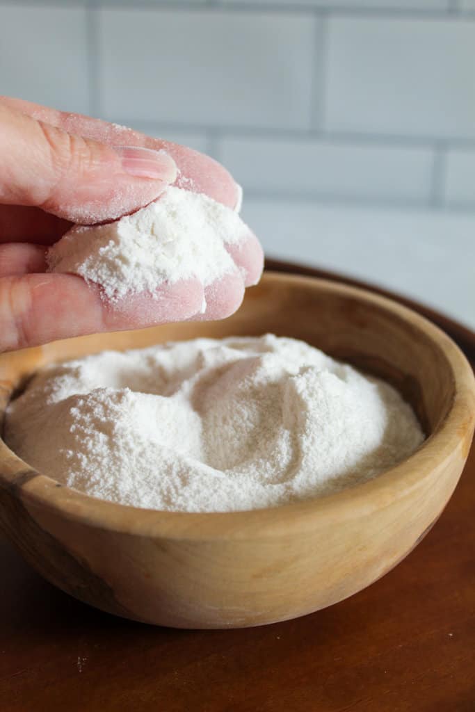 hand holding sweet rice flour.