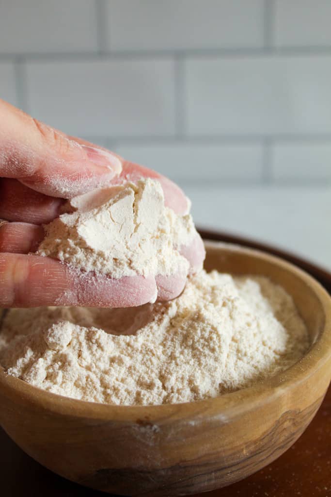 hand holding cassava flour.