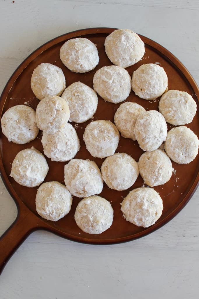 serving dish of mexican wedding cookies.