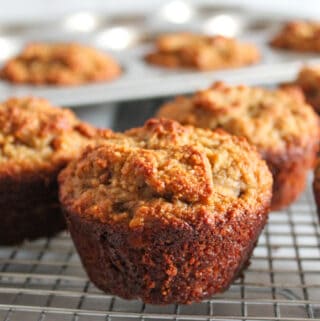 almond flour banana muffin on a wire rack.