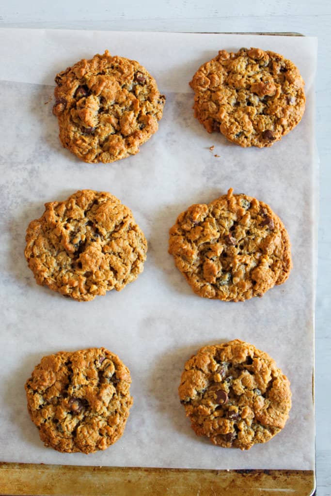 baked monster cookies on a pan.