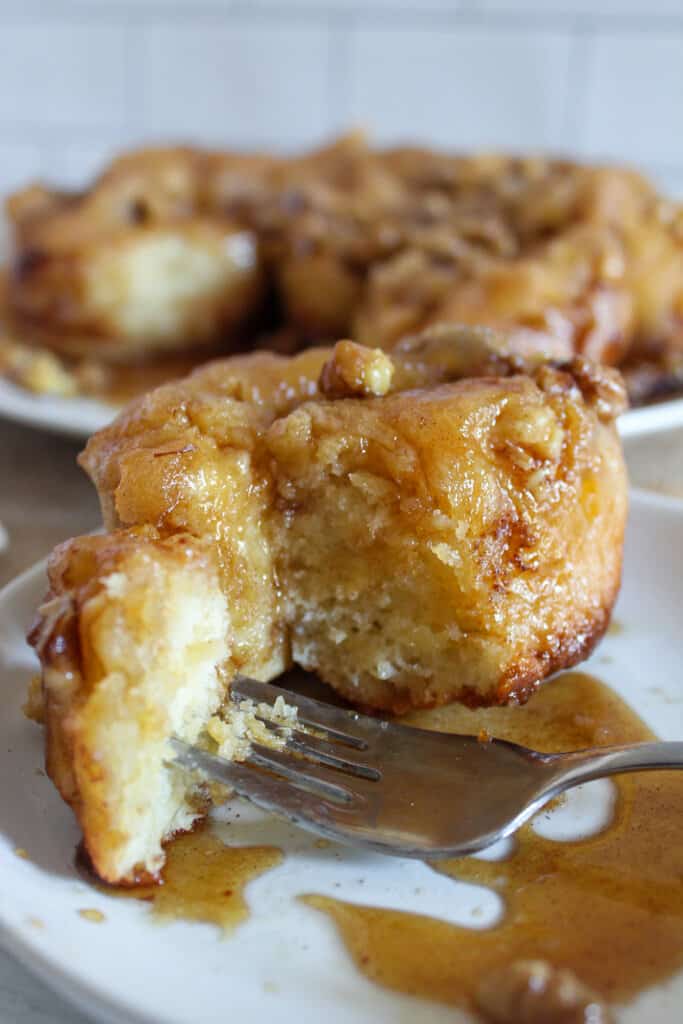 bite on a fork of gluten free sticky buns.
