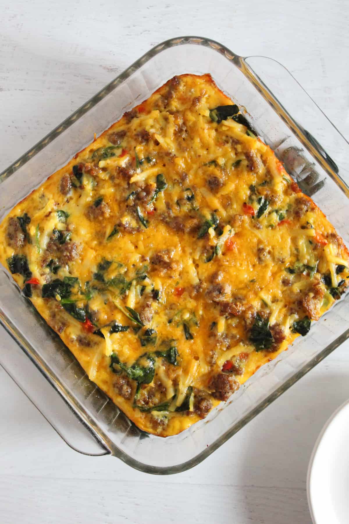 baked egg sausage casserole in a dish.