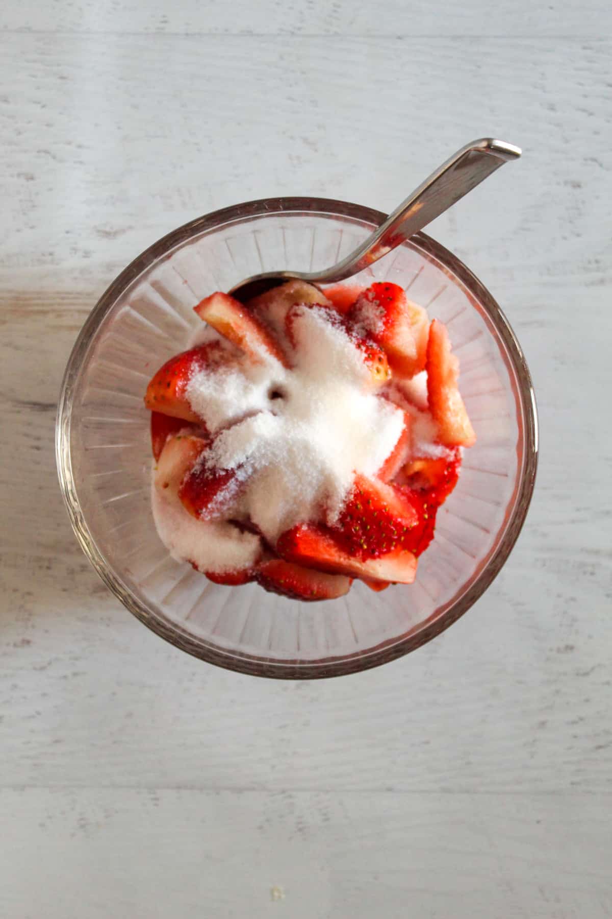 sliced strawberries with sugar.