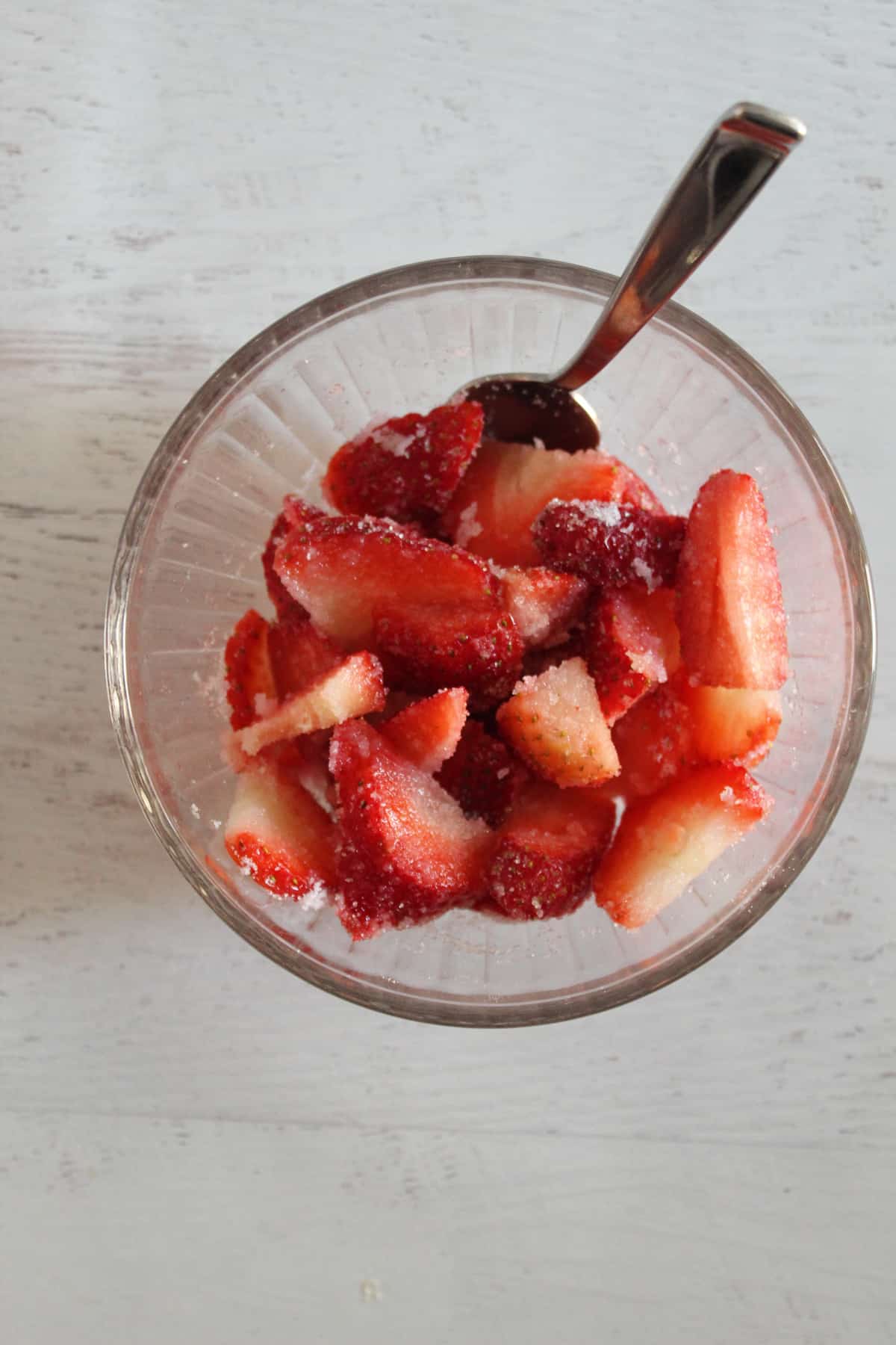bowl of sliced strawberries.