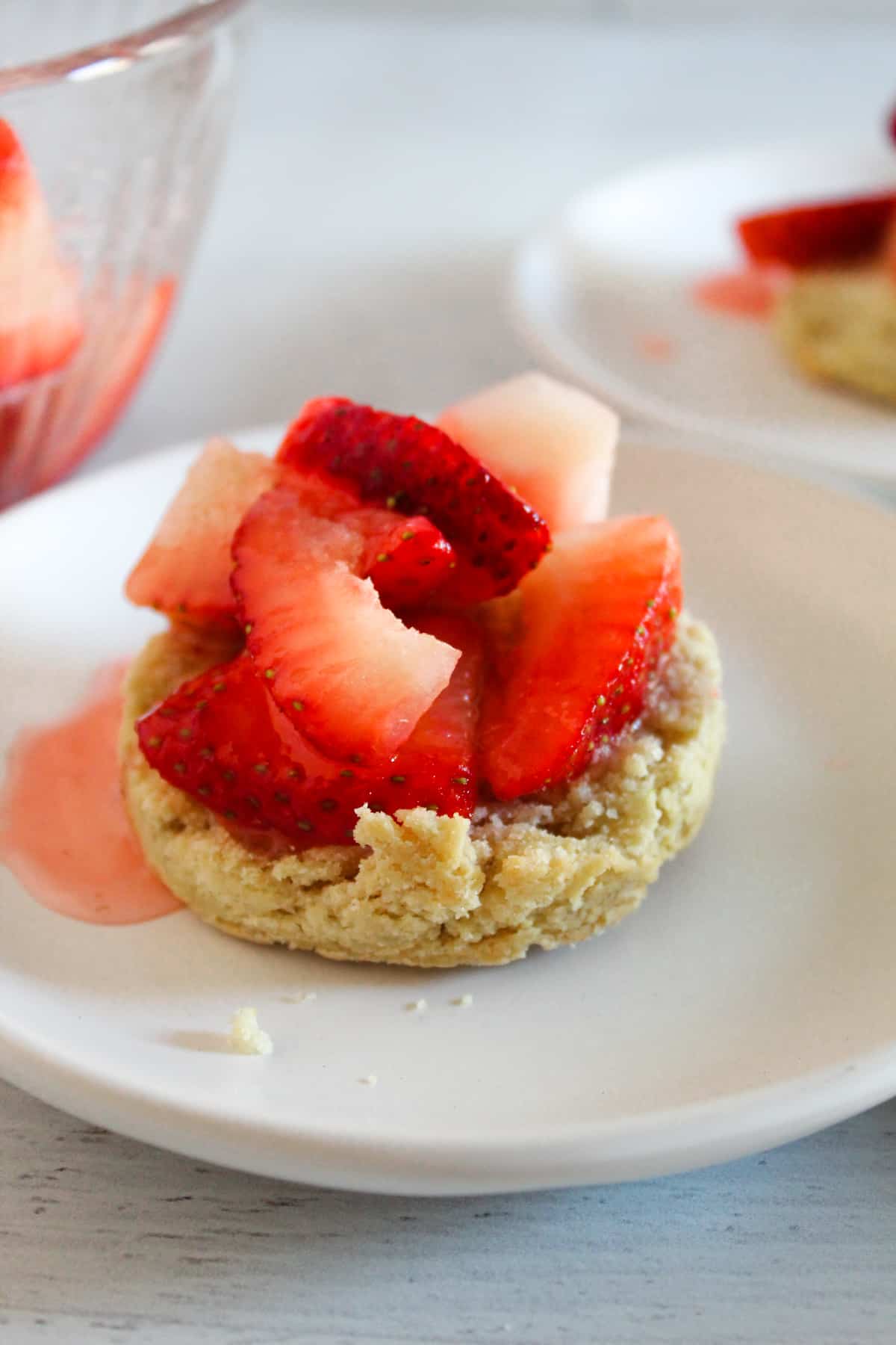 assembling the gluten free strawberry shortcakes.