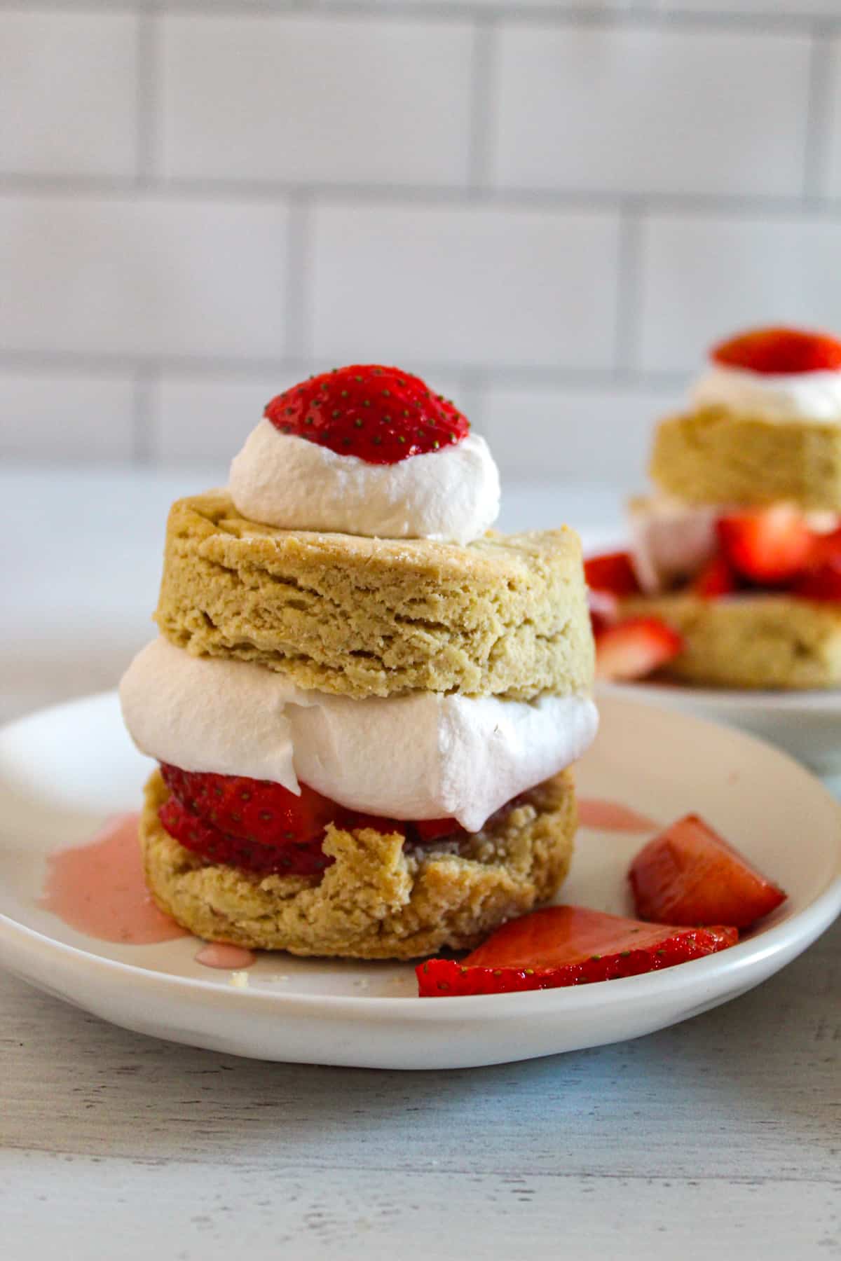 gluten free strawberry shortcake on a white serving plate. 