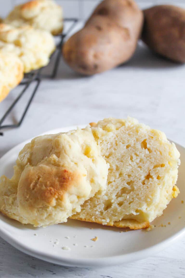 gluten free potato roll on a white plate.