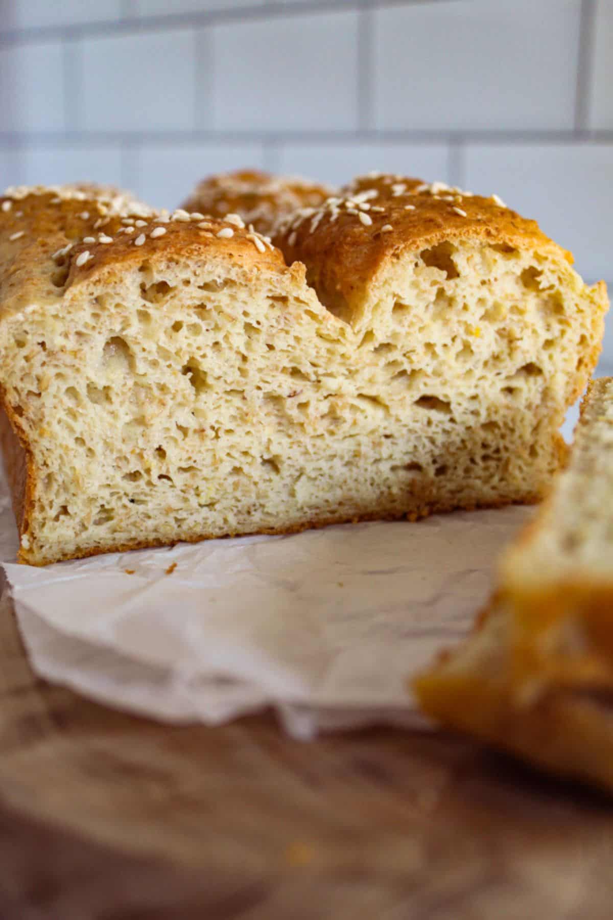 inside of flaxseed bread on a cutting board made in the gluten free bread class